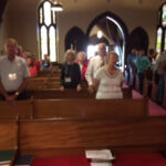 Neighboring congregations of St Luke's and Heaven-Bound Ministries share a worship service