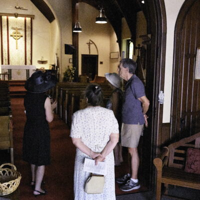 Visitors explore the church after ceremony conducted by the National Society of United States Daughters of 1812.